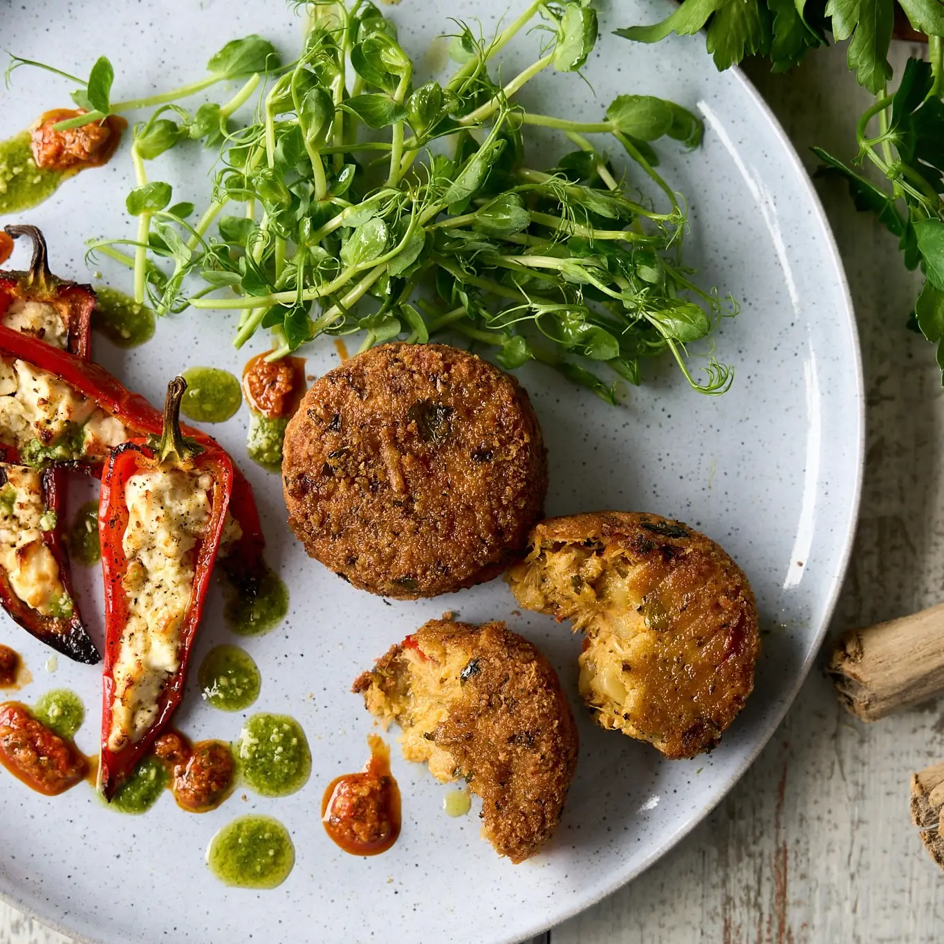 Mac 'n' harissa fishcakes with salad
