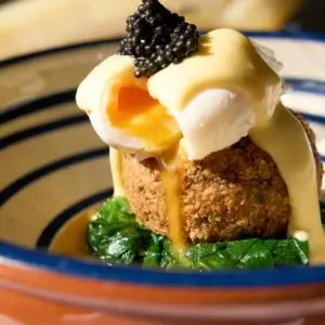 Smokey Bill Fishcake with poached egg, wilted spinach and caviar